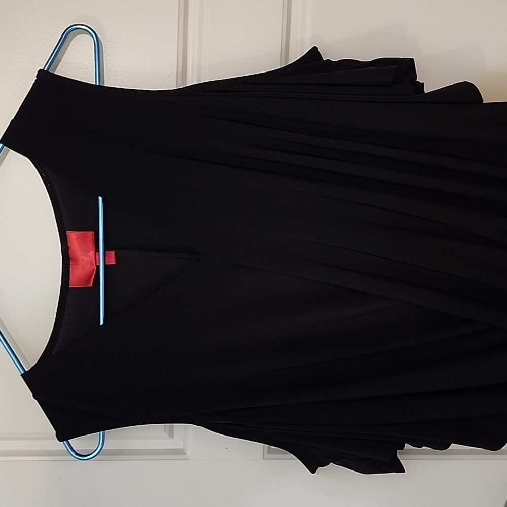 Jennifer Lopez Medium black top cutout shoulder design